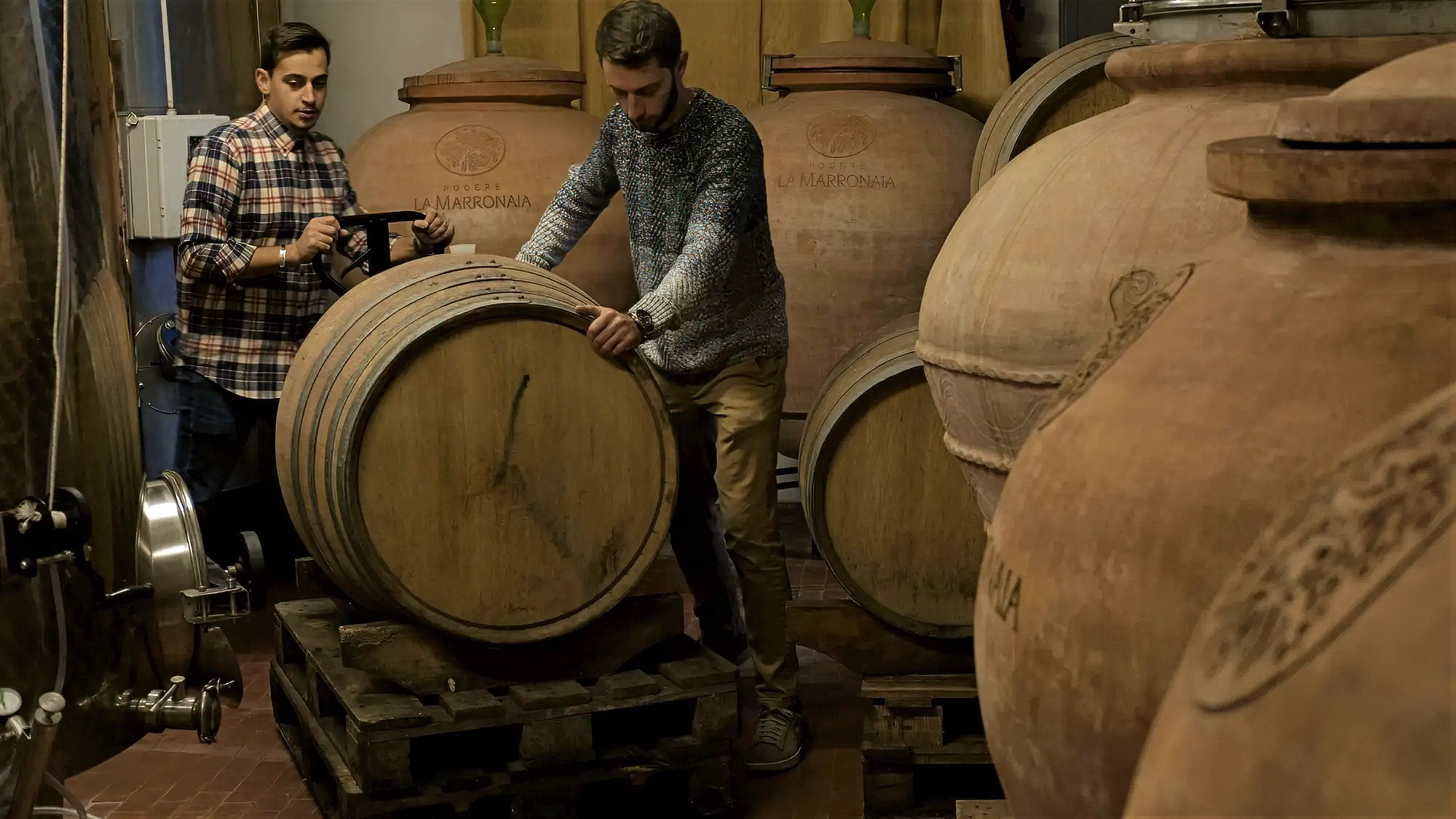 Video frame of La Marronaia agriturismo owners inside the winery, captured by Memento Agency – promotional hospitality footage