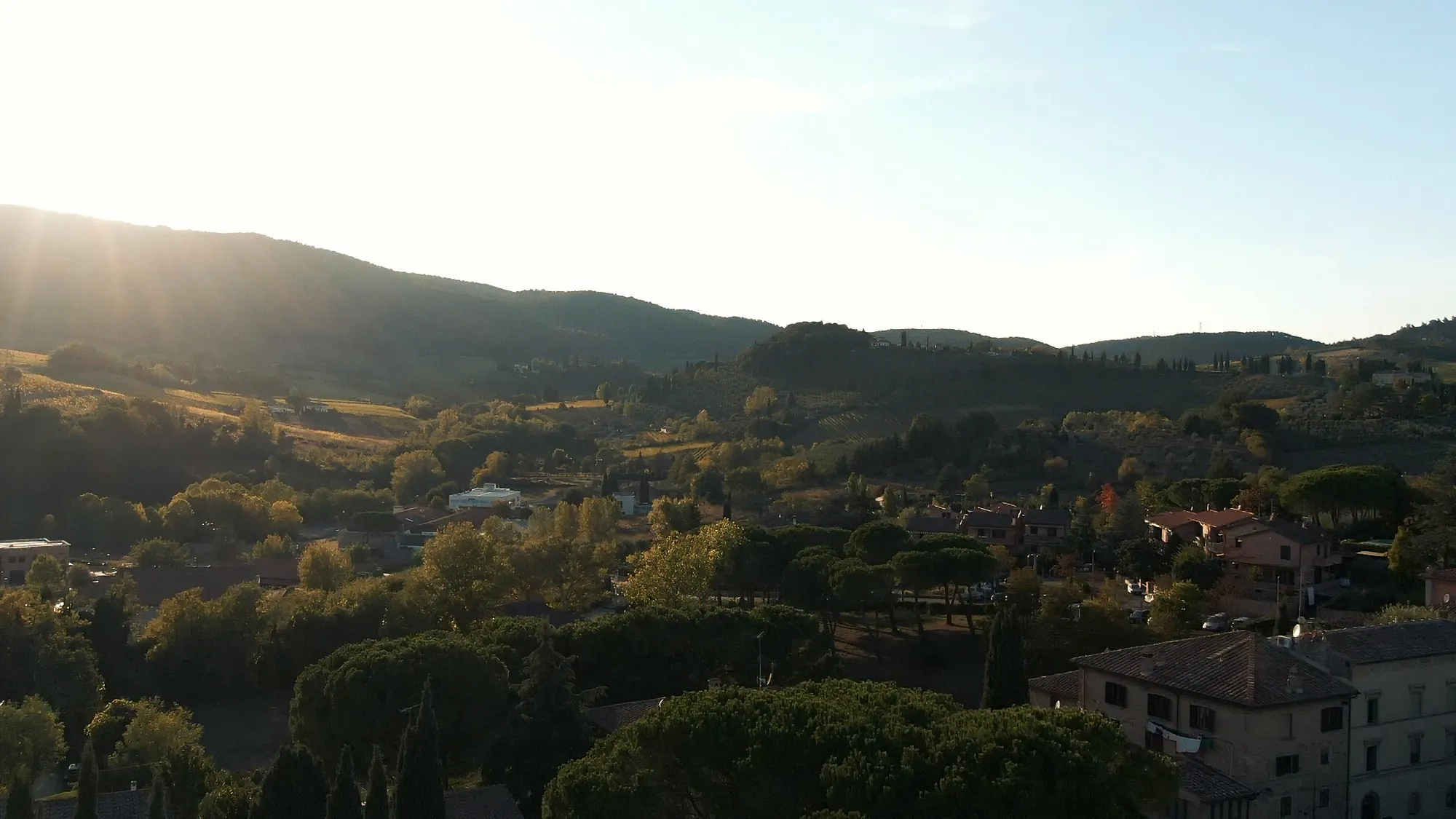 Drone video frame of the surrounding Tuscan landscape around La Marronaia agriturismo, captured by Memento Agency – promotional aerial footage