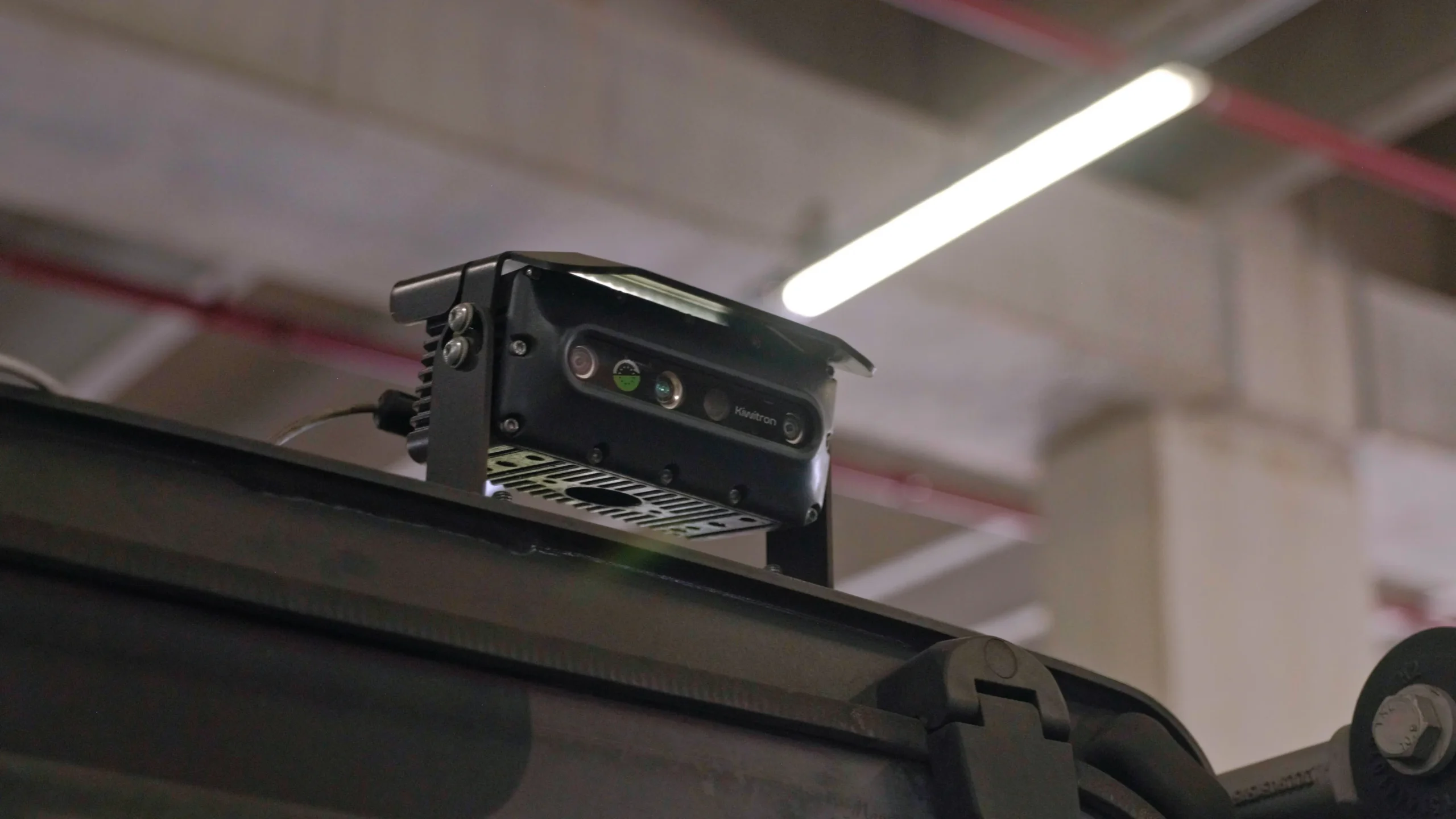 Video frame showing the safety system developed by Kiwitron inside the Bridgestone Italia facility, captured by Memento Agency – industrial promotional footage